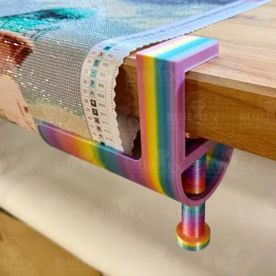 Close-up of a table clamp with a finished picture