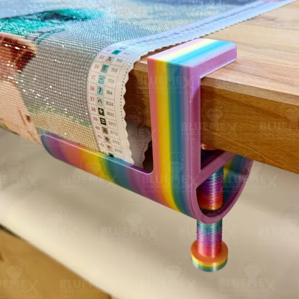 Close-up of a table clamp with a finished picture
