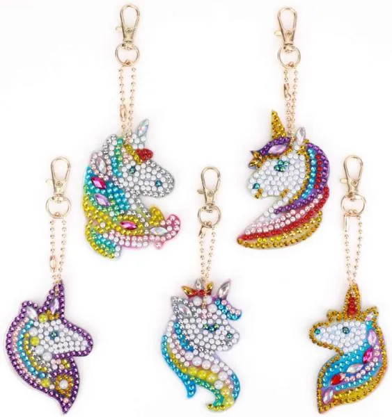 Keyring set, consisting of 5 pendants, motif unicorn, painting set complete with rhinestones